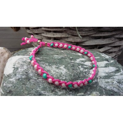 gevlochten wax koord armband in fel roze en turquoise gevlochten wax koord armband in fel roze en turquoise